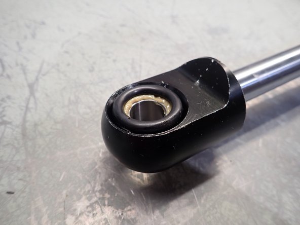 Install new O-rings on both side of bearing.