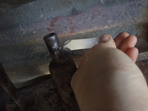 Remove OEM washers as shown by red circle. Clean carefully all the studs to remove rust, then apply grease on them.