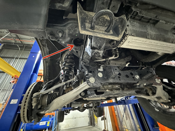 Remove the skid plate.