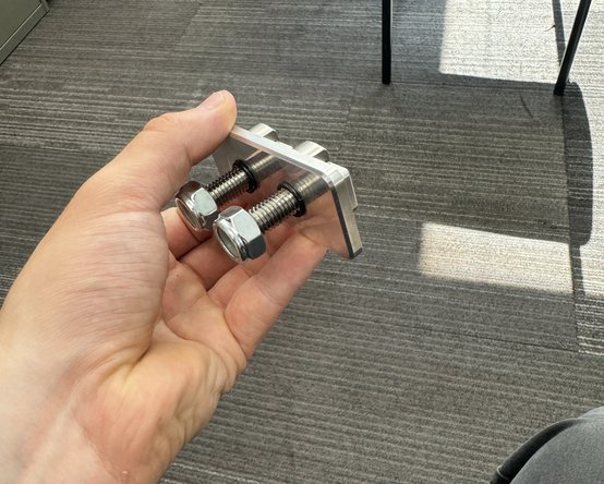 When the bracket holder is inserted in the frame hole, turn the studs 90 deg as show in the picture to lock in place the bracket holder in the frame hole