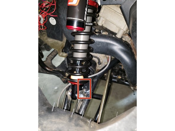 On Stage 2, Stage 4 and Stage 5 models, the lower shock eyelets should be installed with the rebound adjuster oriented towards the back of the vehicle as shown by the  Red square on the photo ( Right side shown ). If needed, you can turn the lower eyelet to orient properly.