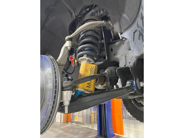 Remove upper arm ball joint nut and seperate it from steering knuckle.