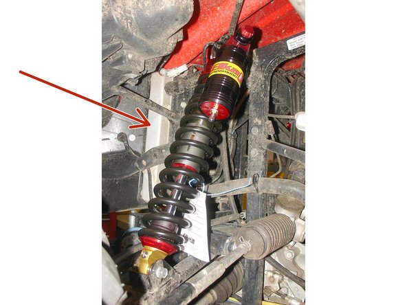 Install the Elka shock absorbers bolting the top mount first with the piggyback reservoirs towards the rear with the compression adjustments facing towards the outside of the vehicule.