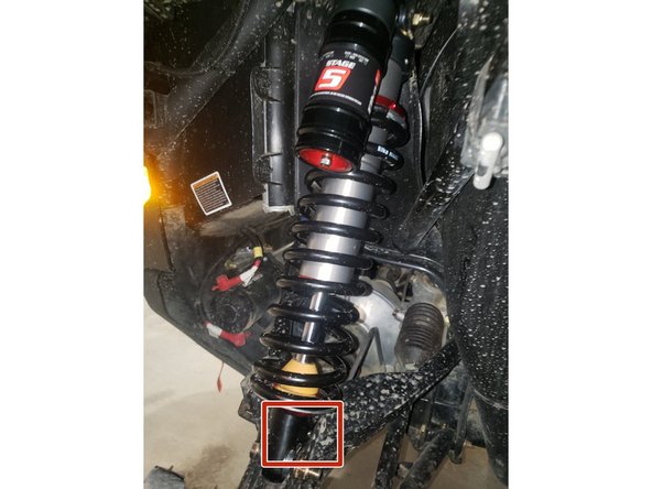On Stage 2, Stage 4 and Stage 5 models, the lower shock eyelets should be installed with the rebound adjuster (red square) oriented towards the back of the vehicle as shown by the Red square on the photo ( left side shown ). If needed, you can turn the lower eyelet to orient properly.