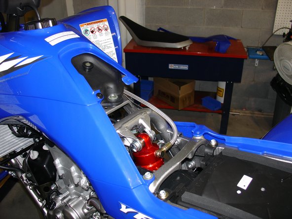 Lift the vehicle off the ground with a jack or on a stand. Remove the stock shock absorbers from the vehicle.