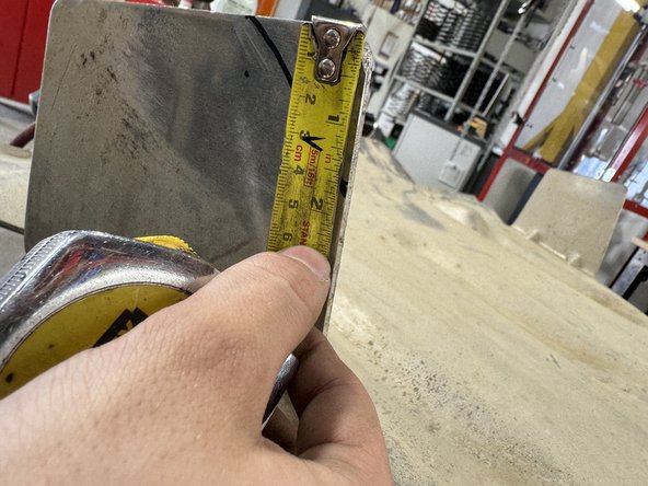 Cut the red triangle of the skid plate on both sides.