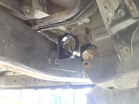 Follow same steps as the left side for fixing reservoir bracket.