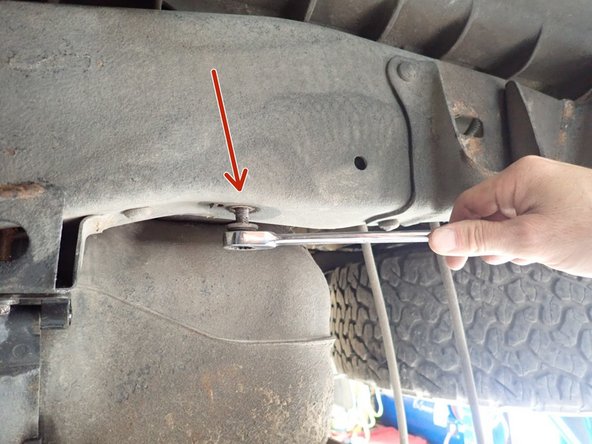 On the left side, use lower existing bolt to fix bracket, and use provided nylon-lock bolt in the existing hole to secure it.