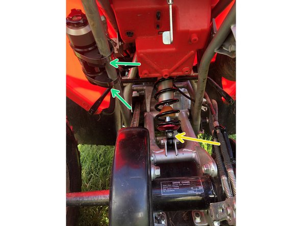 On Stage 3, Stage 4, and Stage 5 models, the remote reservoir neet to be attach on the sub-frame as showed on the picture . Use the rubber parts and clamp provide with your new elka shock  (green Arrow)