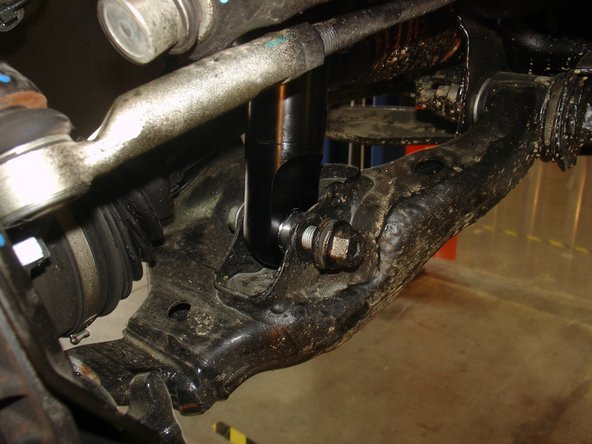 Re-install the lower oem bolt then tighten all the bolts.