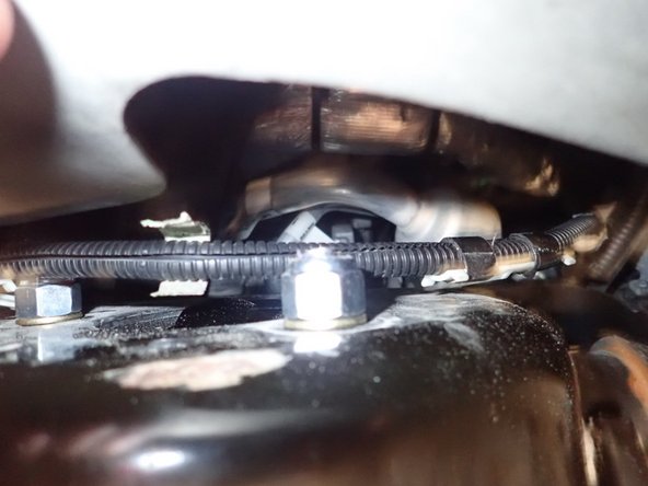 Install supplied upper bolts and washers, then do the same for lower mounting bolts. Tighten all bolts.