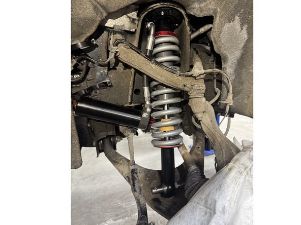 Install the 3 uppers bolts and torque to 35 Ft-Lb.