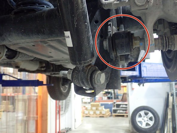 Remove sway-bar link (showed by red circle) on both sides to allow rear axle to drop down much as it can.