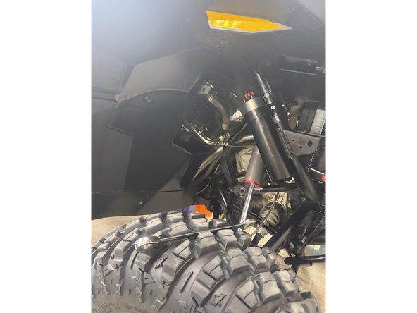 On models with rebound, the lower shock eyelets must be installed with the rebound adjuster oriented toward the rear of the vehicle. If needed, rotate the lower eyelet to ensure proper orientation.