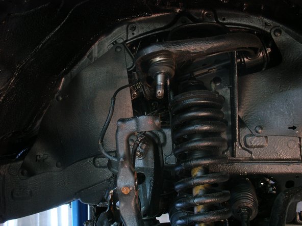 Remove upper arm ball joint nut and seperate it from steering knuckle.