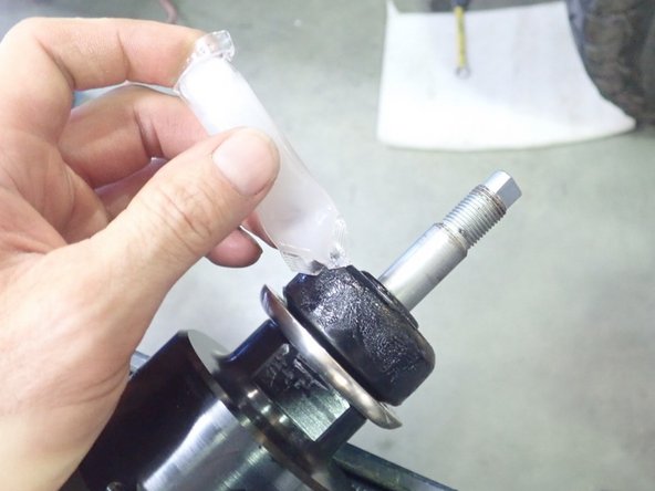 Apply provided grease on Elka upper bushings.