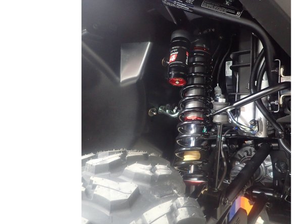 Install the front new Elka shocks with the head at the top of vehicle. For Stage 3-4-5 shocks, reservoir must face the outside of vehicle (Right side shown).