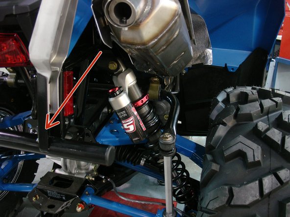 Install  both new Elka rear shock with the piggyback reservoir at the top and oriented towards the rear of the vehicle as indicated by the red Arrow on the photo. (Right side shown)