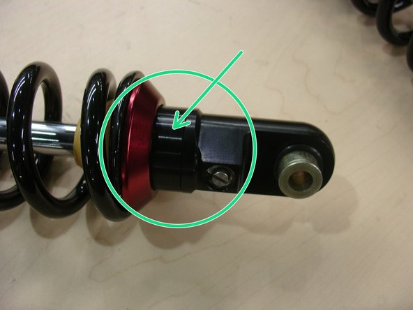 If using an aftermarket exhaust system that requires or allow removal of the stock exhaust bracket, the user can remove those stroke limiters to gain an additional 1-1/8&quot; of wheel travel (see green arrow on photo 3). You might need to reduce spring preload or completely remove the spring(s) to remove the stroke limiter.