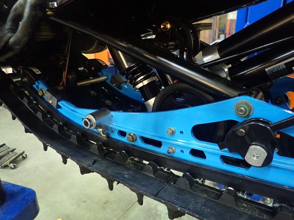 Remove the limiter strap and idler wheels