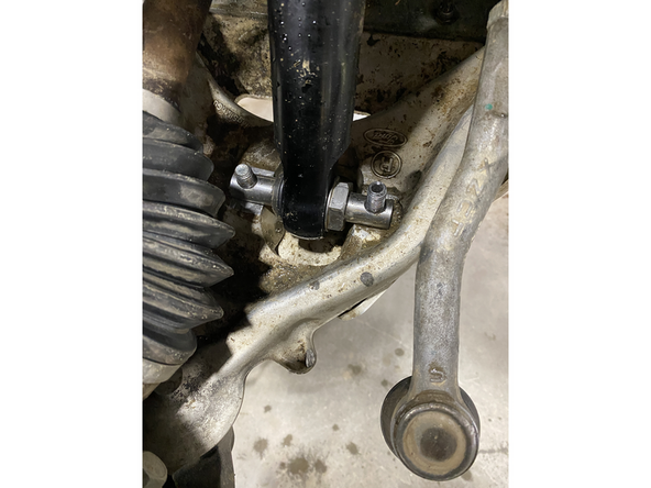 Install the Elka shocks using provided lower bolts and the provided upper bolts. Hoses must face the front of vehicle as shown (right side shown).