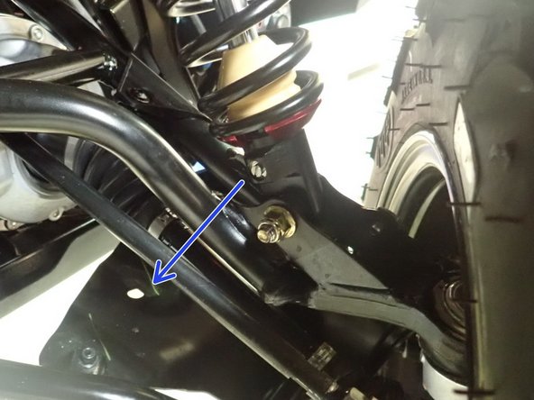 On Stage 2, Stage 4 and Stage 5 models, the lower shock eyelets should be installed with the rebound adjuster oriented towards the rear of the vehicle as shown by the blue Arrow on the photo ( Right side shown ). If needed, you can turn the lower eyelet to orient properly.