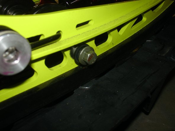 Unscrew lower shaft bolts. You may need to use impact gun. Remove upper bolt.