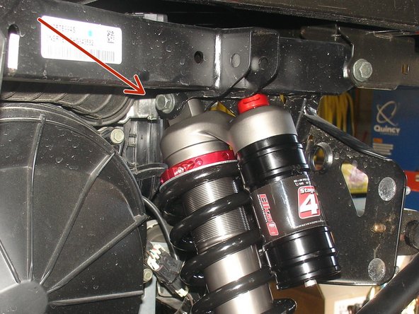 The upper bolt fo shocks must be installed in the inner frame hole as shown by red Arrow.