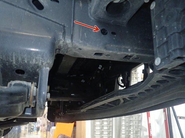 PASSENGER SIDE: Slide the small washer on the long 8mm bolt. Insert the bolt in the LEFT HOLE of the bracket assembly.