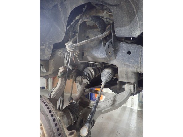 Separate the upper control arms from the steering knuckle.