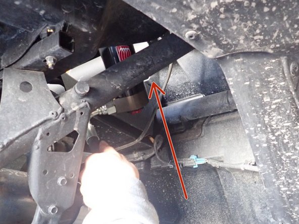 Installing the new Elka rear shocks. The hose of the reservoir line need to pass into the plastic bed open section and the reservoir need to be install on the rear part of the cage with the braket provide by ELKA