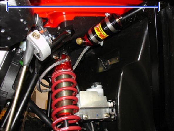 Install the Elka shock absorbers bolting the top mount first with the banjo bolt (connected to the shock head) facing towards the outside of the vehicule. Orient the hose towards the front of the vehicule.
