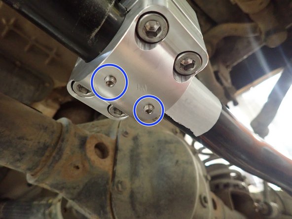 Tight set screws under clamp as shown by blue circles.