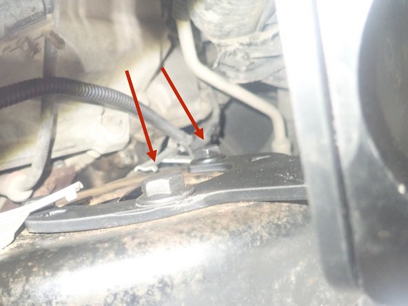 Reservoir bracket should be installed on top of upper shock mount as shown using 2 out of the three upper bolts.