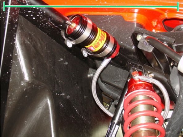 Install the reservoir with the banjo bolt (connected to the reservoir) facing towards the front of the vehicule.