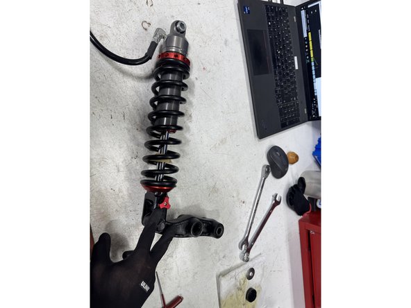 Install the linkage on the new Elka shock. Make sure it faces the same way.