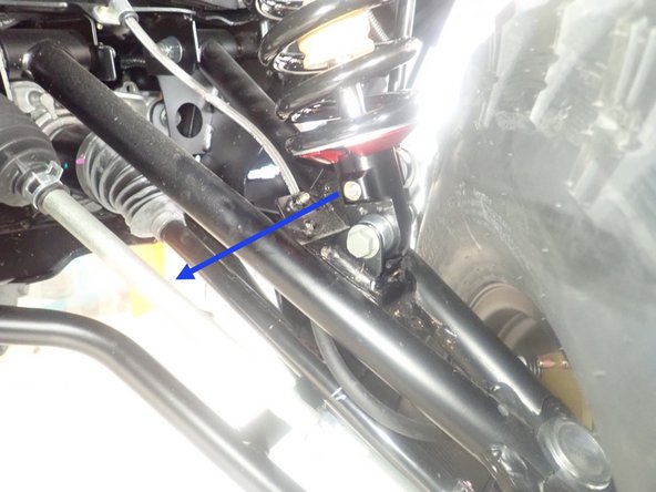 On Stage 2, Stage 4 and Stage 5 models, the lower shock eyelets should be installed with the rebound adjuster oriented towards the rear of the vehicle as shown by the blue Arrow on the photo ( Right side shown ). If needed, you can turn the lower eyelet to orient properly.