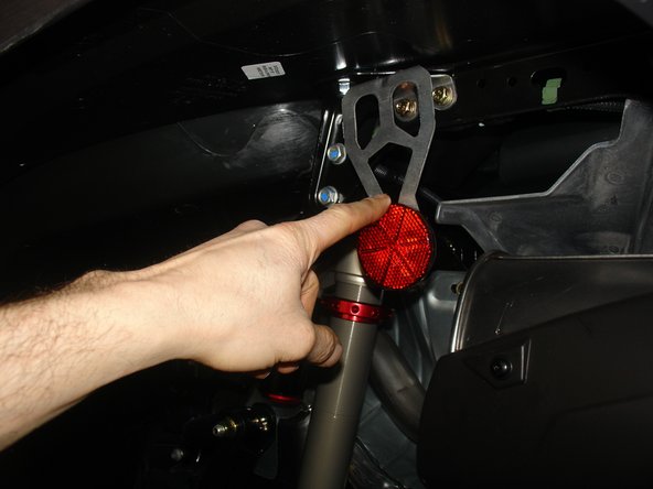 Remove the both side reflectors at the rear of vehicle. The Elka shocks give more wheels travel and they can be damaged.