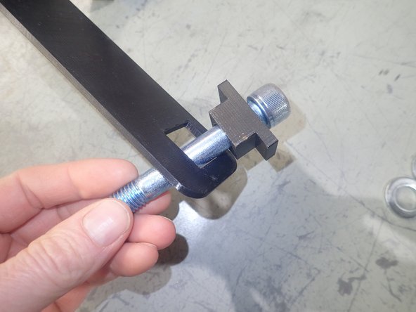 Install shocks so as to direct the hose fitting toward front of vehicle, and hose outside of frame. ( Right side shown).