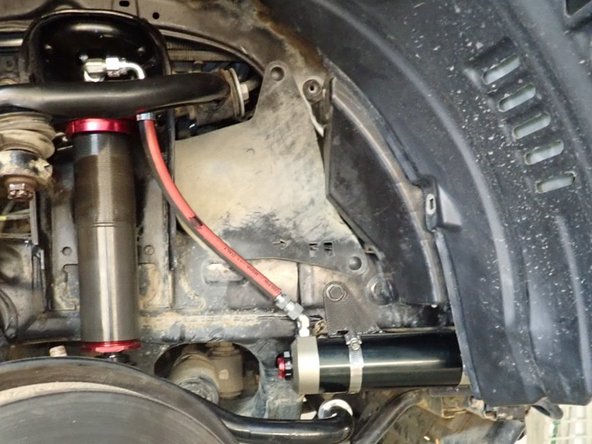 Slide reservoir holding collars into bracket.