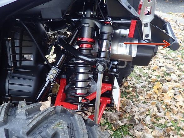 Install both new Elka rear shocks with the piggyback reservoir at the top and oriented towards the rear of the vehicle as indicated by the red Arrow on the photo. ( Left side shown ).