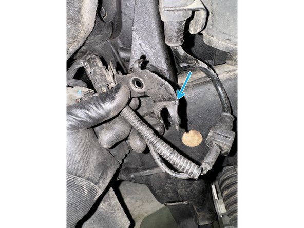 Unfold the clip of the ABS wires bracket to fit the bracket proprely.