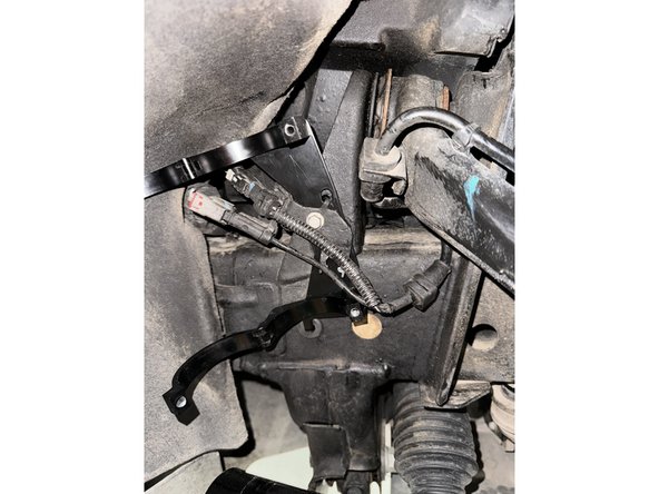 Install the bracket in the factory hole as the right side.