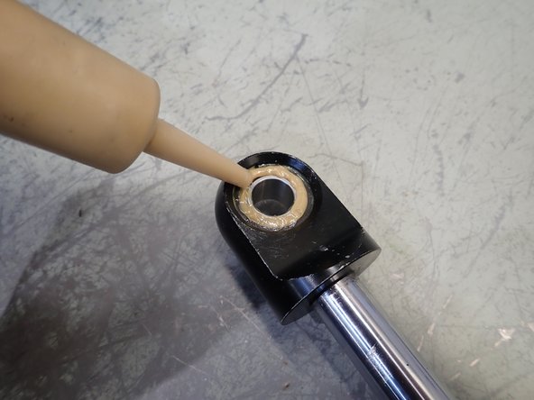 Apply some grease on both sides of bearing.