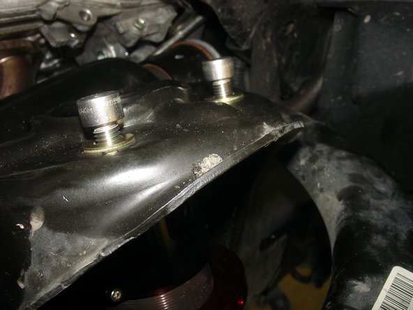 Install provided bolts and washers to fix the top plate. Torque them at 35 Ft/Lb.