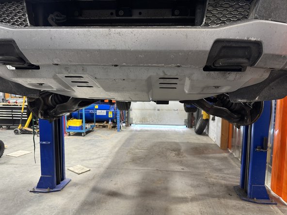 Remove the skid plate.