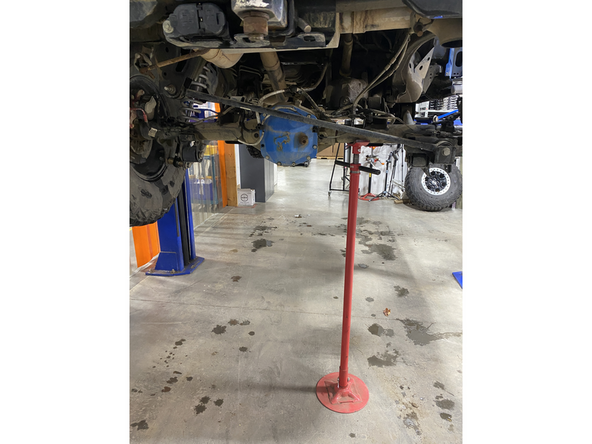 support the rear differential before removing the OEM shock.