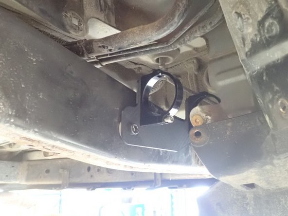 Follow same steps as the left side for fixing reservoir bracket.