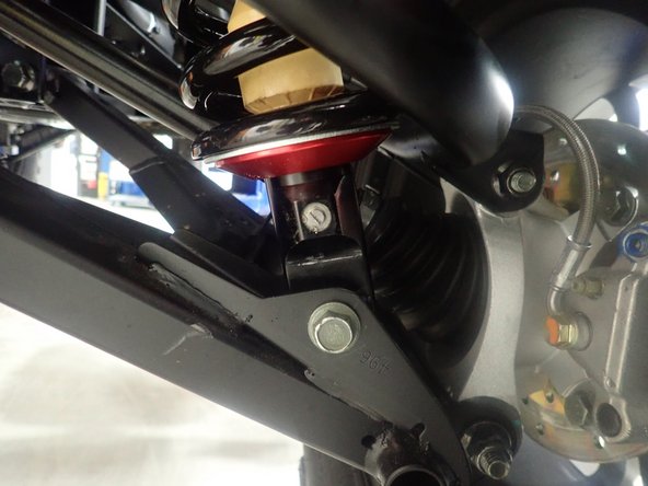 On Stage 2, Stage 4 and Stage 5 models, the lower shock eyelets should be installed with the rebound adjuster oriented towards the rear of the vehicle (Right side shown). If needed, you can turn the lower eyelet to orient properly.