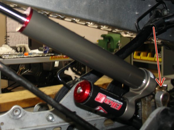 Add grease in the head bushing of the shock before installing the sleeve thru the linkage.